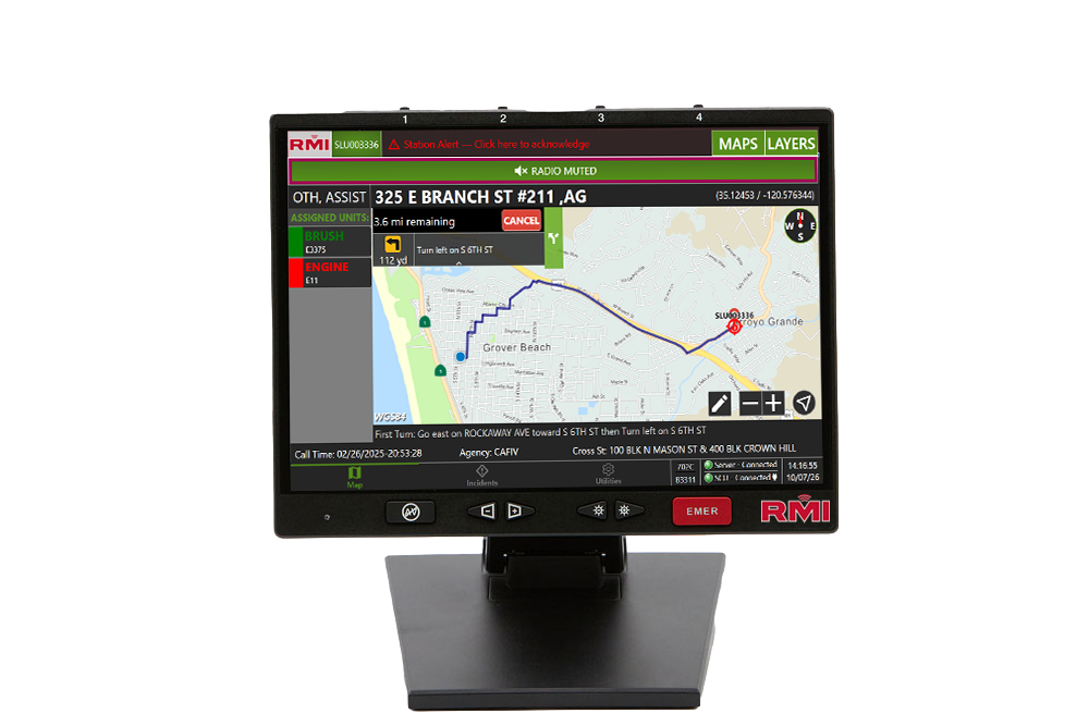 RadioMobile (RMI) Command Desk Terminal (CDT) displaying a fire station alert, assigned emergency response units, and a mapped response route.
